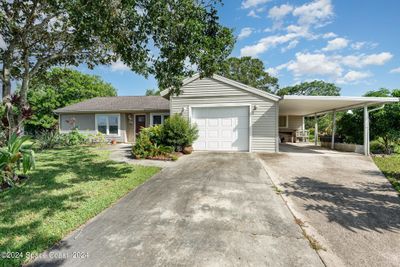 1564 Satinwood Court Ne, House other with 4 bedrooms, 2 bathrooms and null parking in Palm Bay FL | Image 2