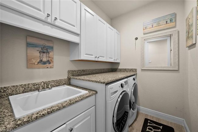 Well equipped laundry | Image 32