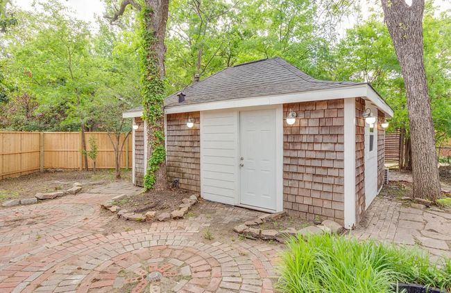 View of outbuilding featuring a fenced backyard | Image 21
