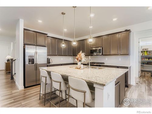 881 Meadowlark Dr, Erie, CO, 80516-7070 | Card Image