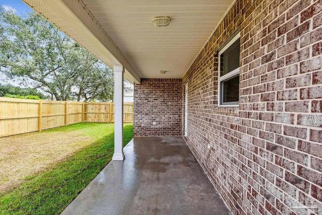 8512 Esplanade St, House other with 4 bedrooms, 2 bathrooms and 2 parking in Navarre FL | Image 10
