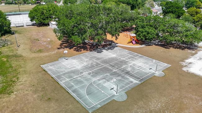 Nearby basketball courts and playground | Image 5