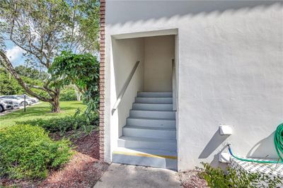 Stairwell to the second floor unit | Image 3