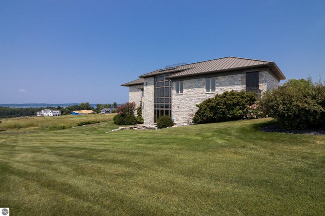 4173 Dornoch Ct, House other with 6 bedrooms, 4 bathrooms and null parking in Williamsburg MI | Image 62