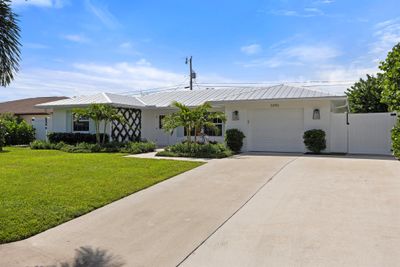 3390 Coral Place, House other with 4 bedrooms, 3 bathrooms and null parking in Tequesta FL | Image 2