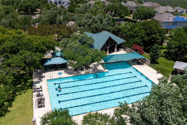 The community pool offers a refreshing escape, perfect for leisurely swims or relaxing by the water on warm Austin days | Image 37