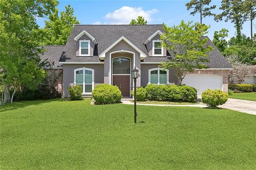 1424 Woodmere Dr, Mandeville, LA, 70471-7458 | Card Image