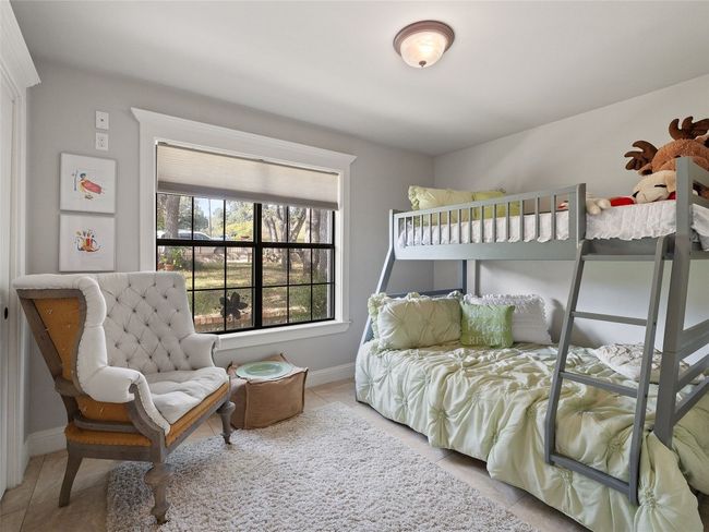 Bedroom 2 overlooks the front yard. | Image 33