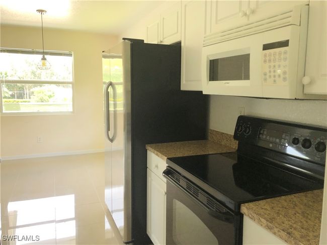 5615 Birdsong Ln, Home with 4 bedrooms, 2 bathrooms and null parking in BOKEELIA FL | Image 10