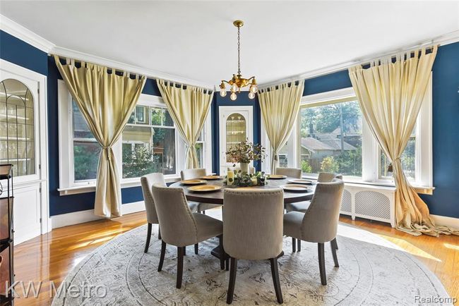 Dining room with original light fixture | Image 13