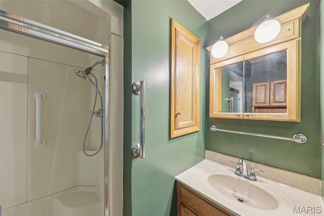 Full bath with vanity and a shower | Image 23