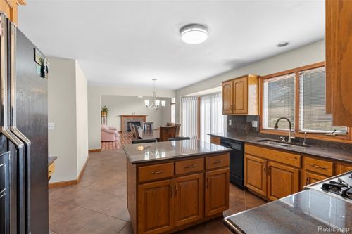 47668 Whippoorwill Dr, Macomb, MI, 48044-5905 | Card Image
