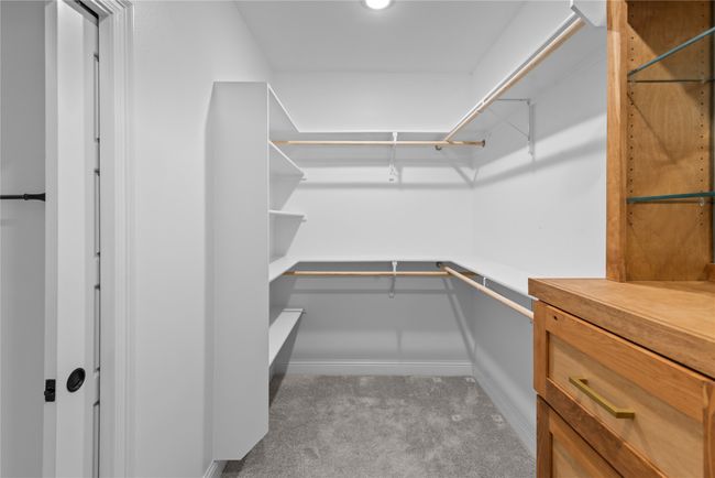 Spacious closet with carpet | Image 14
