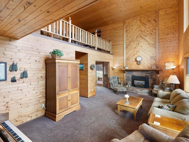 The gas-burning fireplace is perfect for warming up on chilly autumn and winter afternoons. | Image 25