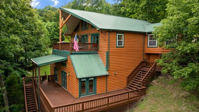 Welcome to lake life at 460 Shawnee Path - the log home of your dreams on Lake Malone! | Image 1