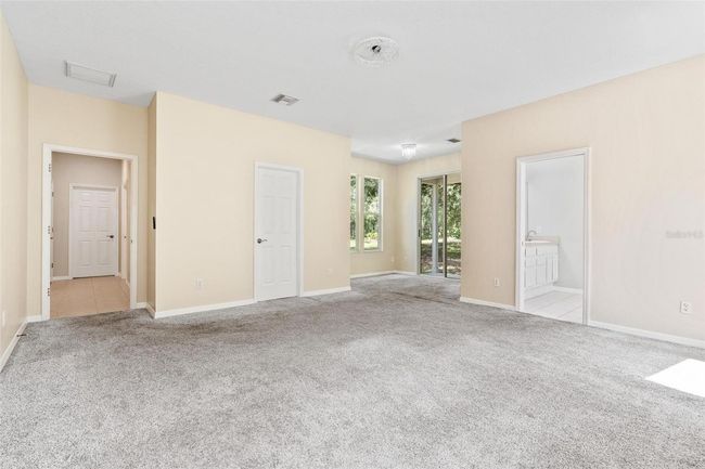 11933 Pasco Trails Blvd, House other with 4 bedrooms, 3 bathrooms and null parking in SPRING HILL FL | Image 18