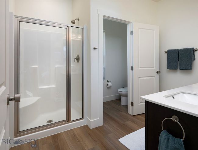Primary bathroom with glass enclosed shower | Image 19
