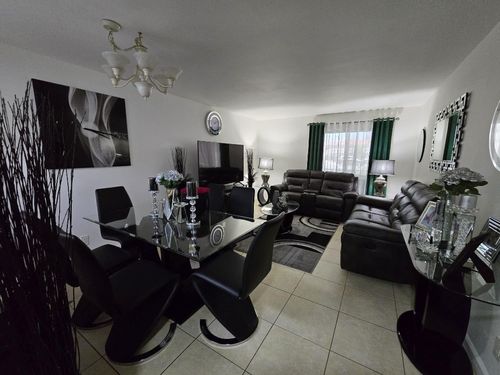 119-10001 W Atlantic Blvd, Coral Springs, FL, 33071-6560 | Card Image