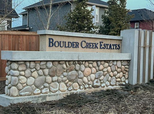 556 Boulder Creek Bay Se, Home with 3 bedrooms, 2 bathrooms and 4 parking in Langdon AB | Image 48