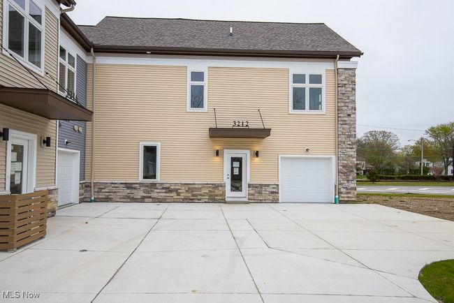 View of front of property featuring a garage | Image 31