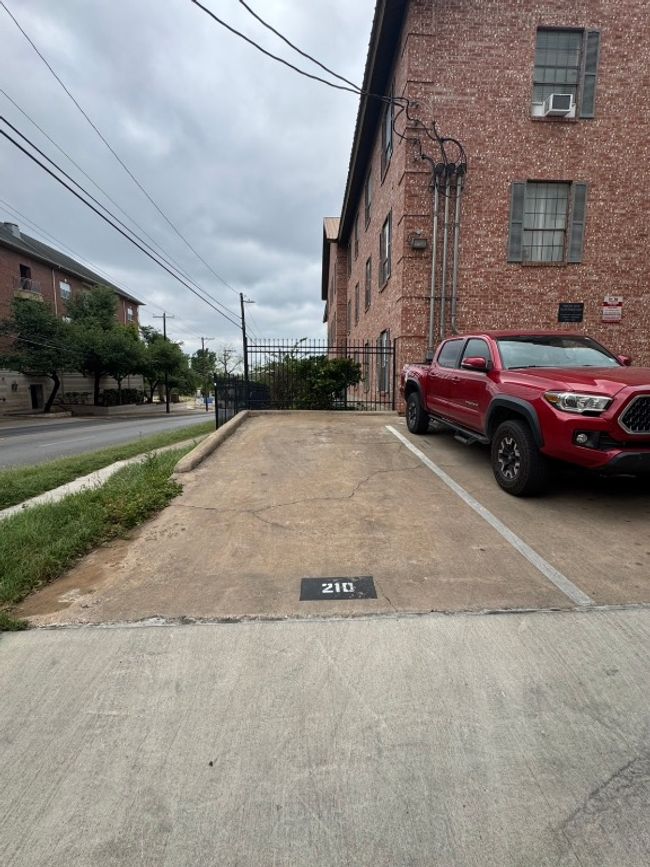 Parking space on side of building | Image 32