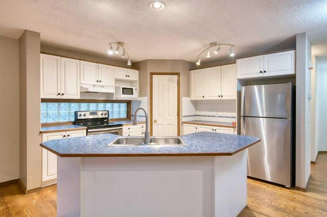 321 Douglas Ridge Pl Se, House detached with 3 bedrooms, 2 bathrooms and 2 parking in Calgary AB | Image 15