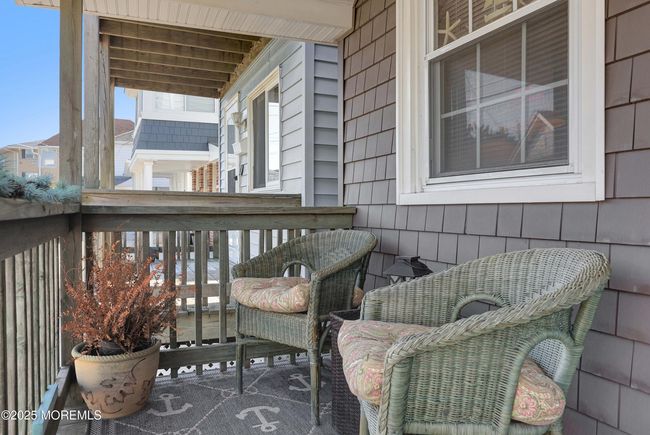 Cozy covered front porch. New vinyl siding. | Image 5