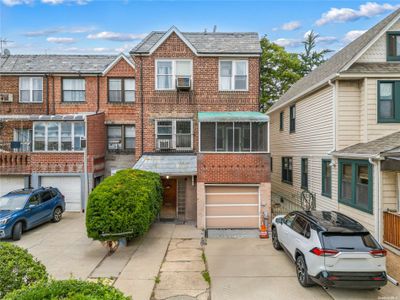 86-09 Eliot Ave, Home with 6 bedrooms, 3 bathrooms and null parking in Rego Park NY | Image 1