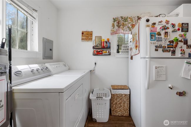 DADU laundry area off of kitchen with built-in storage (not pictured) | Image 30