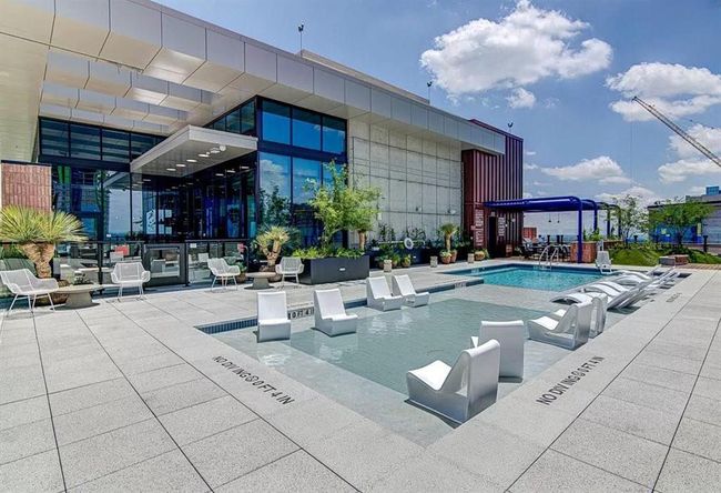 Community pool featuring a patio area | Image 21