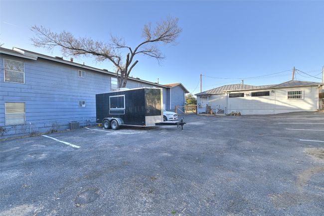 View of uncovered parking lot | Image 15