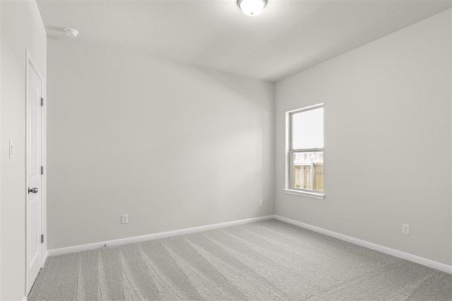 Empty room featuring baseboards and light carpet | Image 23