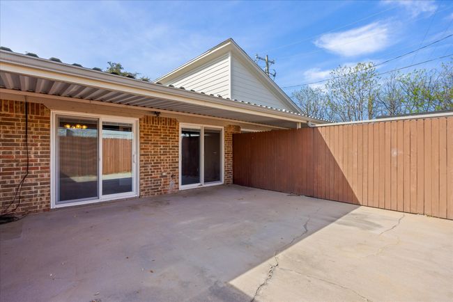 Back patio-courtyard-partially covered + open area. | Image 22