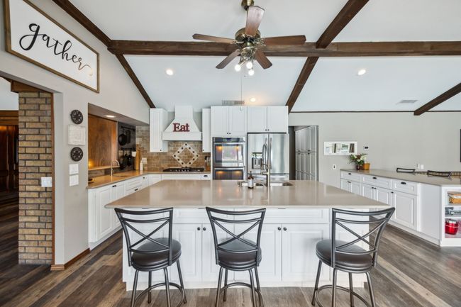 Fully Renovated Kitchen is a Chef’s Dream with Gas Range and Custom Hood | Image 11