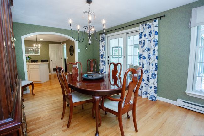 Formal dining room addition perfect for large gatherings. | Image 12