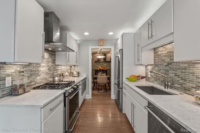 Quartz counters, gas range with electric oven. . . | Image 15