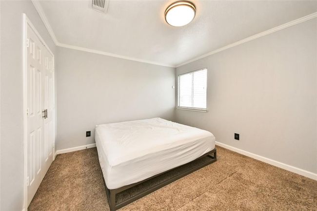 Secondary bedroom on the second floor. | Image 22
