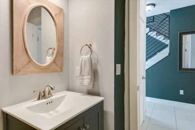 Half bath located on the main level right off the dining room and kitchen | Image 20