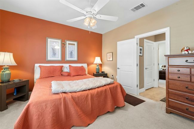 Carpeted bedroom with ceiling fan | Image 20