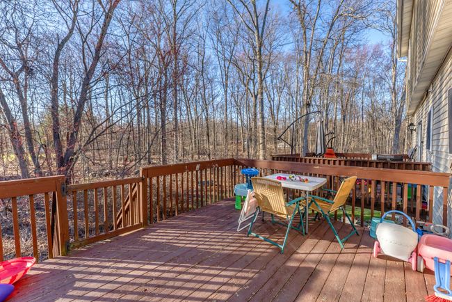 Wooden deck with outdoor dining area | Image 41