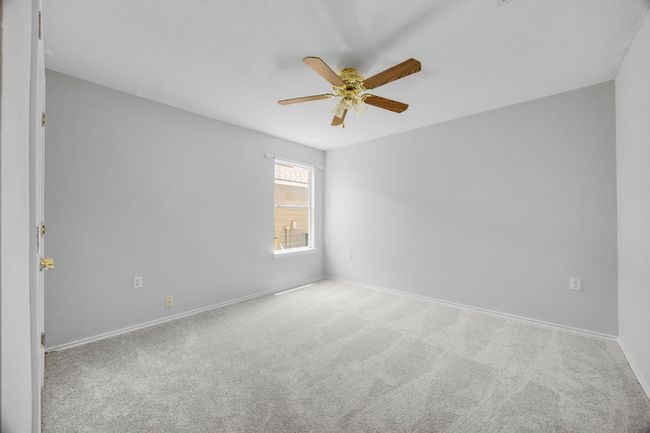 The in-law floorplan features a bedroom and full bath on the main level. | Image 13