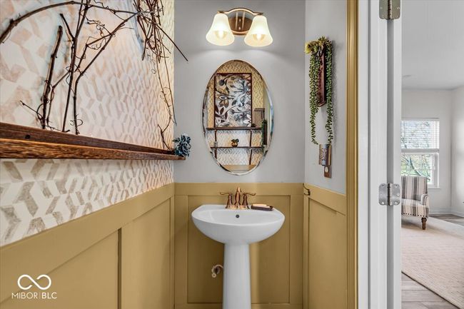 Beautifully remodeled half bathroom on the main floor that you'll be proud to share with guests! | Image 14