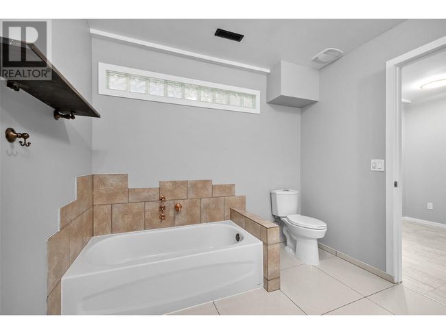 1503 Tanemura Cres, House other with 6 bedrooms, 4 bathrooms and 4 parking in Kelowna BC | Image 35