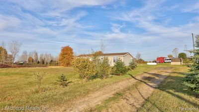 7515 Center Road, Home with 3 bedrooms, 2 bathrooms and null parking in Watertown Twp MI | Image 3