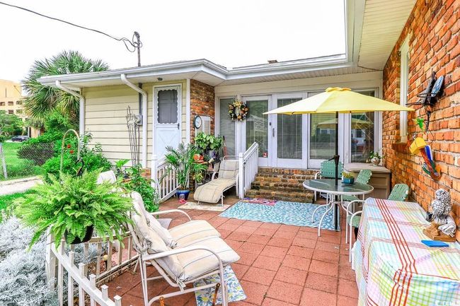 View of patio with entry steps | Image 23