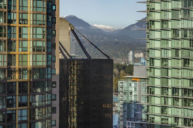 City view featuring a mountain backdrop | Image 16