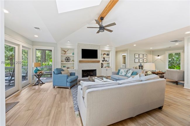 Great Room with tabby fireplace and custom built-ins | Image 8
