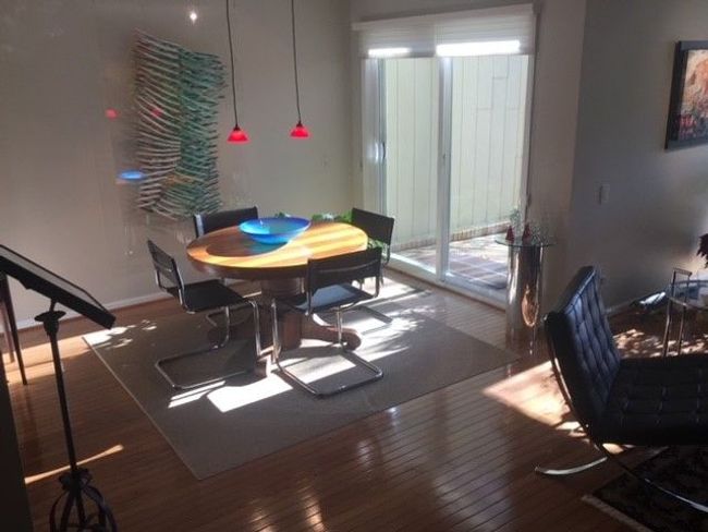 Dining room off living room, also with hrd. wood | Image 8