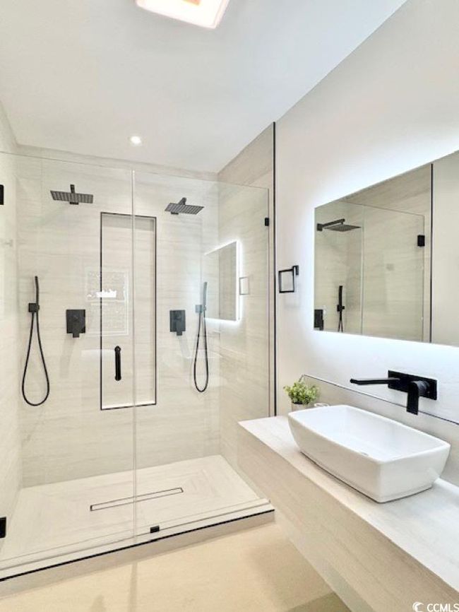 Full bathroom featuring a shower stall, recessed lighting, and vanity | Image 28