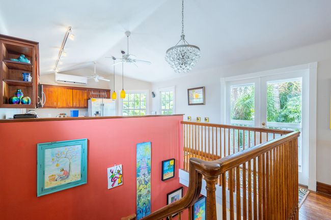 Open staircase showcasing artwork | Image 20